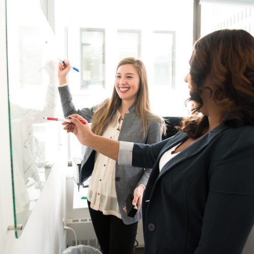 Colleagues on whiteboard