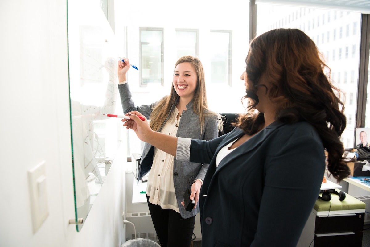 Colleagues on whiteboard