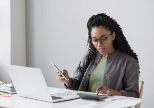 Woman analyzing employee turnover cost savings